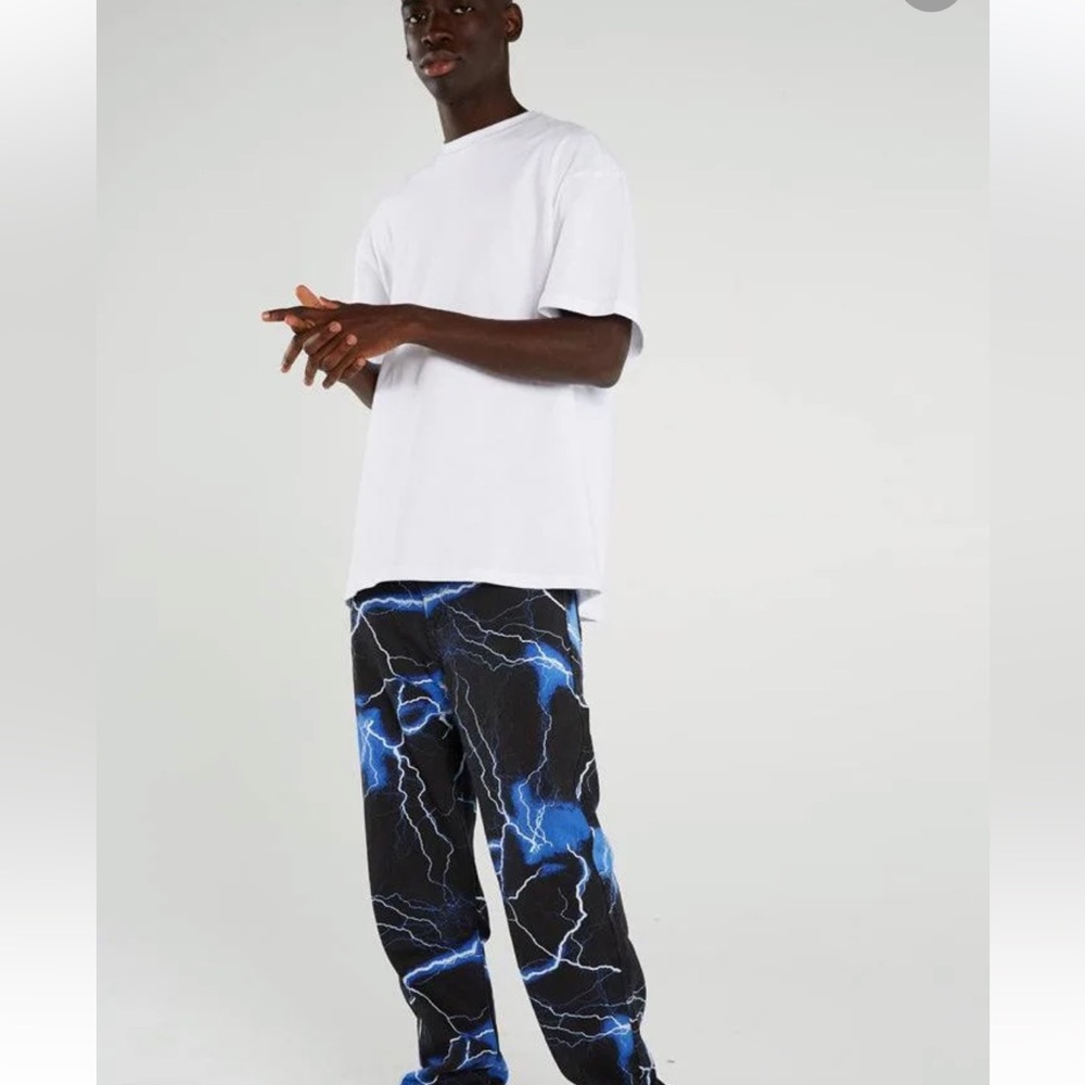2Beautiful lightning print on black jeans